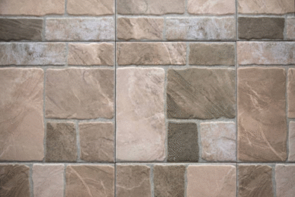 Modern lavatory wall proposing porcelain wall tiles with a marble end.