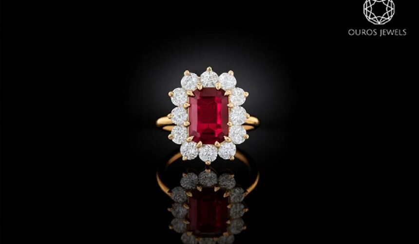 Ouros Jewels ruby halo ring with emerald-cut center stone and diamond accents in gold
